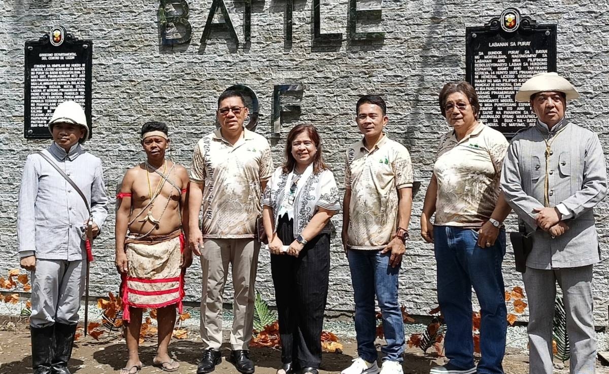 (From left) Republica Filipina Reenactment Group president Joshua Matipo, Indigenous Peoples representative pastor Virgilio Vertudez, municipal mayor Gen. (ret) Ronnie Evangelista, National Historical Commission of the Philippines executive director Carminda Arevalo, municipal vice mayor Edgardo Sison, local historian Hernanie Tan, and historical reenactor Bernard Supetran lead the unveiling of the historical landmarks in Montalban, Rizal, on Thursday, April 25, 2024. CONTRIBUTED PHOTO