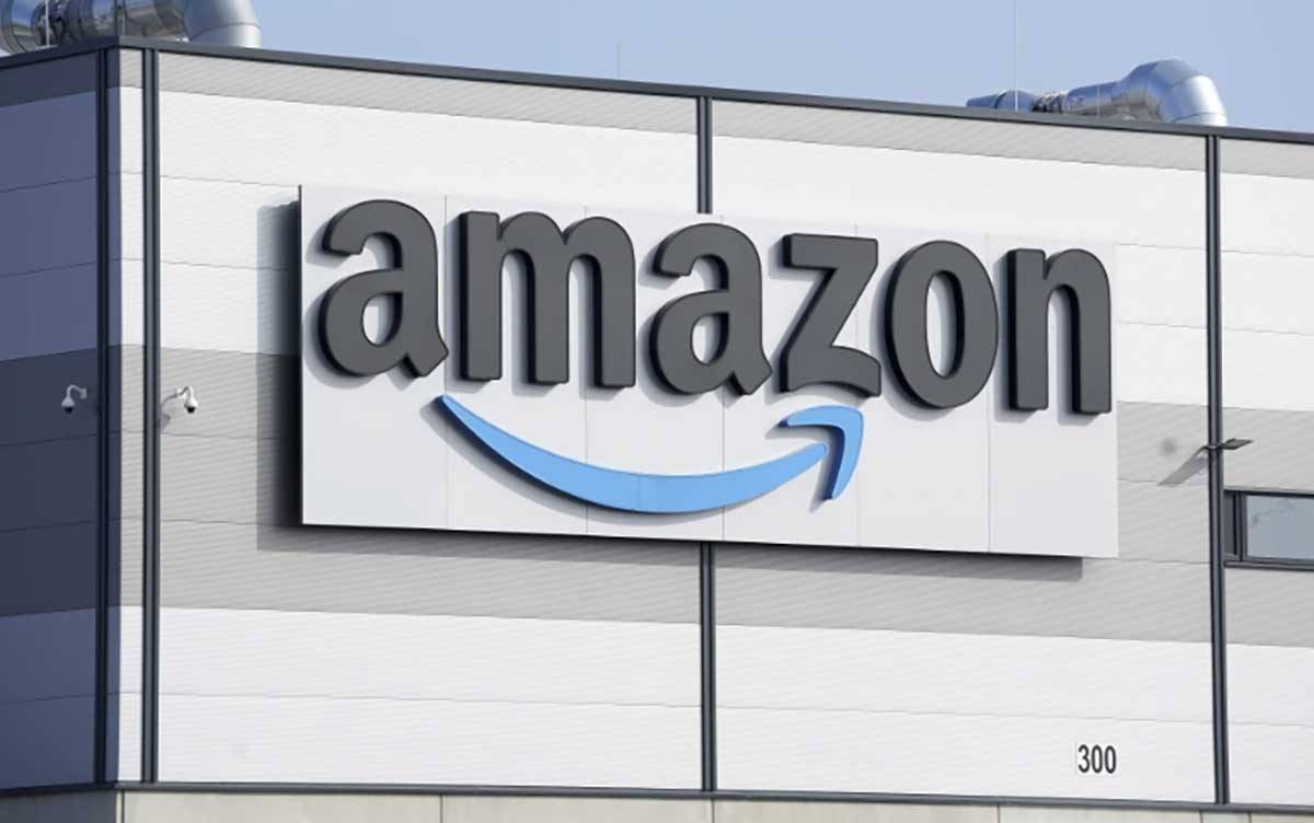 An Amazon company logo is seen on the facade of a company’s building in Schoenefeld near Berlin, Germany, in this file photo from 2022. Amazon has argued in a legal filing that the 88-year-old National Labor Relations Board is unconstitutional, echoing similar arguments made this year by Elon Musk’s SpaceX and the grocery store chain Trader Joe’s in disputes about workers’ rights and organizing. AP PHOTO 