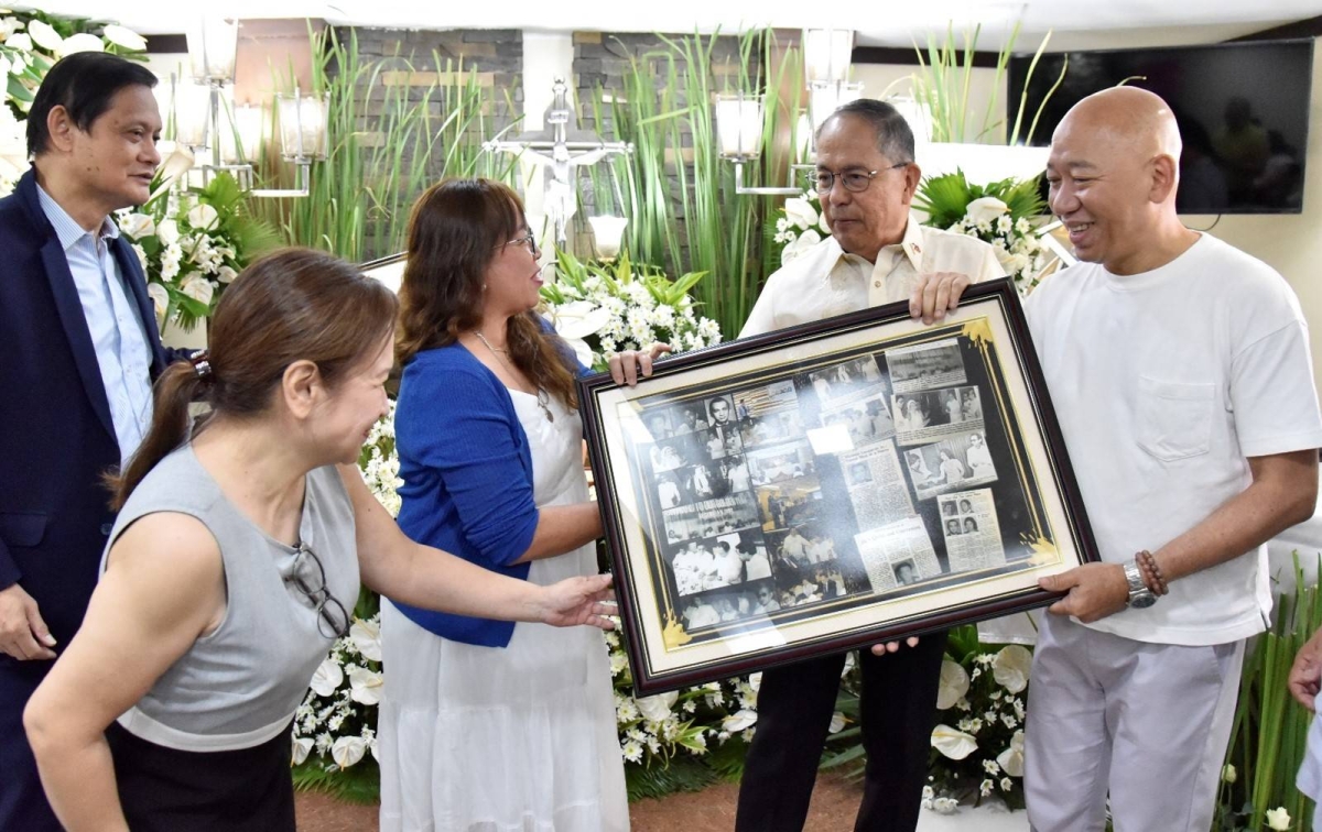 Department of Labor and Employment (DoLE) Secretary Bienvenido Laguesma (2nd from right) and Undersecretary Benedicto Ernesto Bitonio Jr. (left) pay their tribute to the late undersecretary Vicente Leogardo Jr. during a necrological service at the St. Peter Chapel in Quezon City on April 19, 2024. The DoLE family remembers the former undersecretary or deputy minister for his invaluable dedication to public service. He is also a co-author of the Labor Code of the Philippines, which will be celebrating its 50th anniversary on May 1. CONTRIBUTED PHOTO