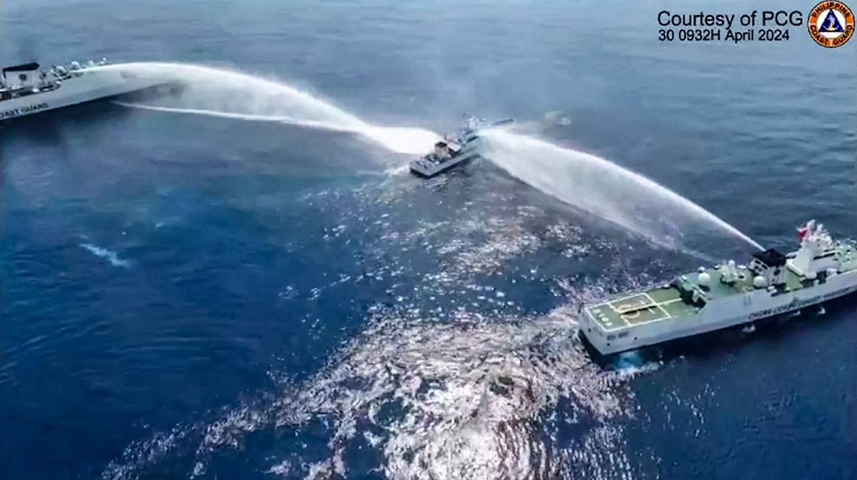 WATER BLITZ This frame grab from a handout video footage taken and released on Tuesday, April 30, 2024, by the Philippine Coast Guard shows the BRP Bagacay being hit by water cannon from Chinese coast guard vessels near the Scarborough Shoal. AFP PHOTO