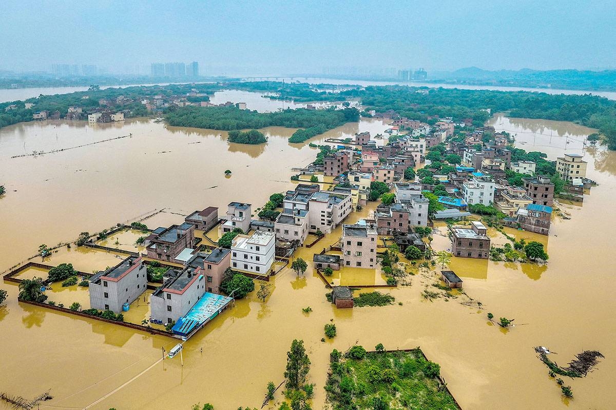 DELUGE This aerial photograph taken on Monday, April 22, 2024, shows flooded buildings and streets after heavy rains in Qingyuan, in southern China’s Guangdong province. More than 100,000 people have been evacuated due to heavy rain and fatal floods in southern China. AFP PHOTO