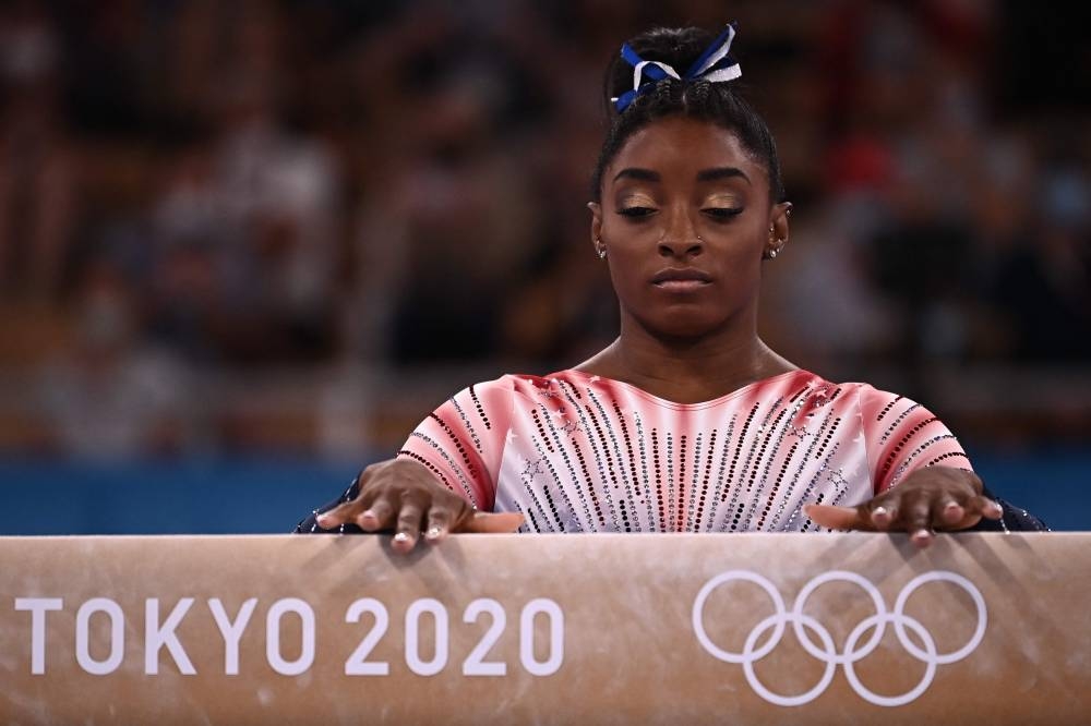 Biles makes Olympics return in beam final The Manila Times