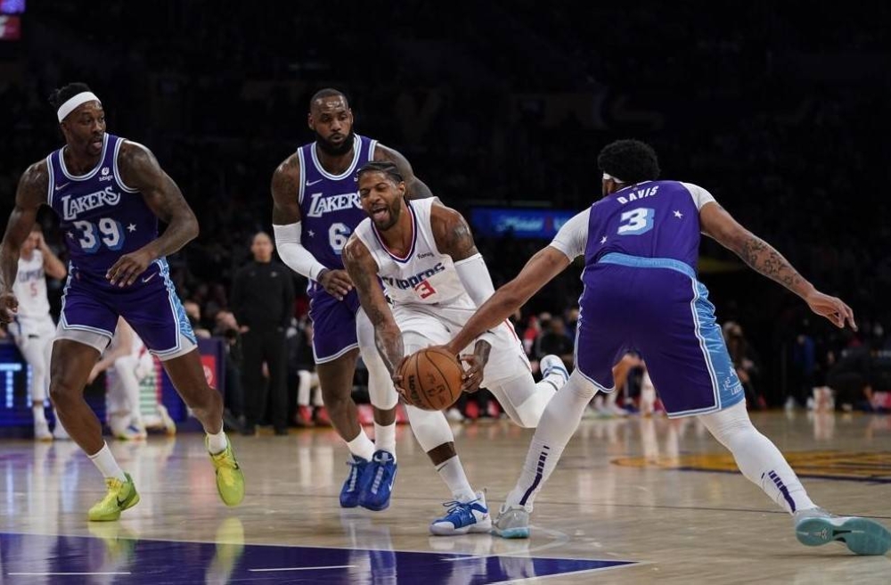 A view of the sneaker shoes of LA Clippers guard Paul George (13