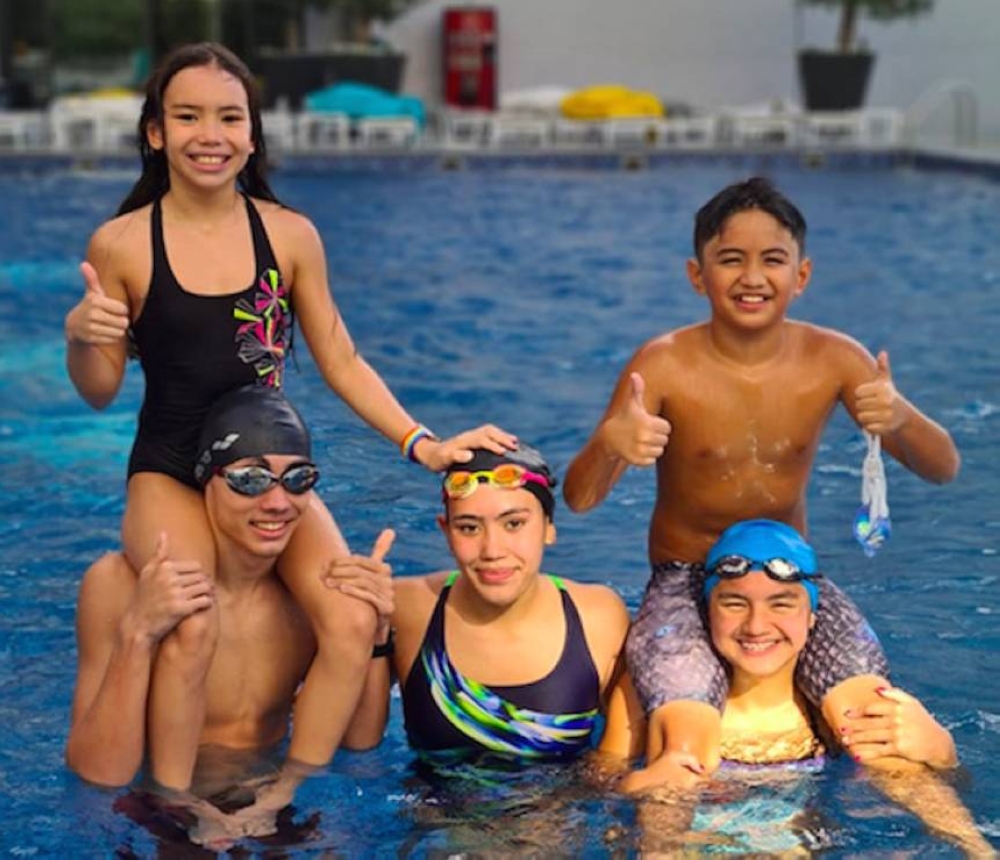 (From left): Hannah, Ruben, and Heather White, and Behrouz Mohammad and Micaela Jasmine Mojdeh. CONTRIBUTED PHOTO