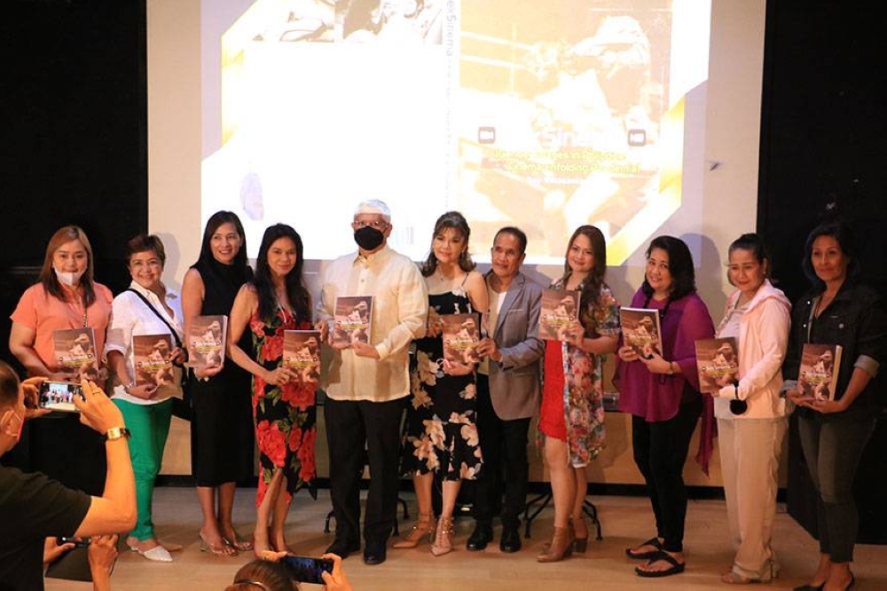 Author Boy Villasanta, (sixth from the right), presented his book to the public. The launch was led by National Book Development Board Chairman Dante Ang 2nd and by former showbiz sexy stars (from left) Amanda Amores, Joy Sumilang, Stella L., Maria Isabel Lopez, Jean Saburit, (Boy Villasanta), Aimee Torres, Tessie Tomas, Liz Alindogan and Yvonne Salcedo. CONTRIBUTED PHOTO