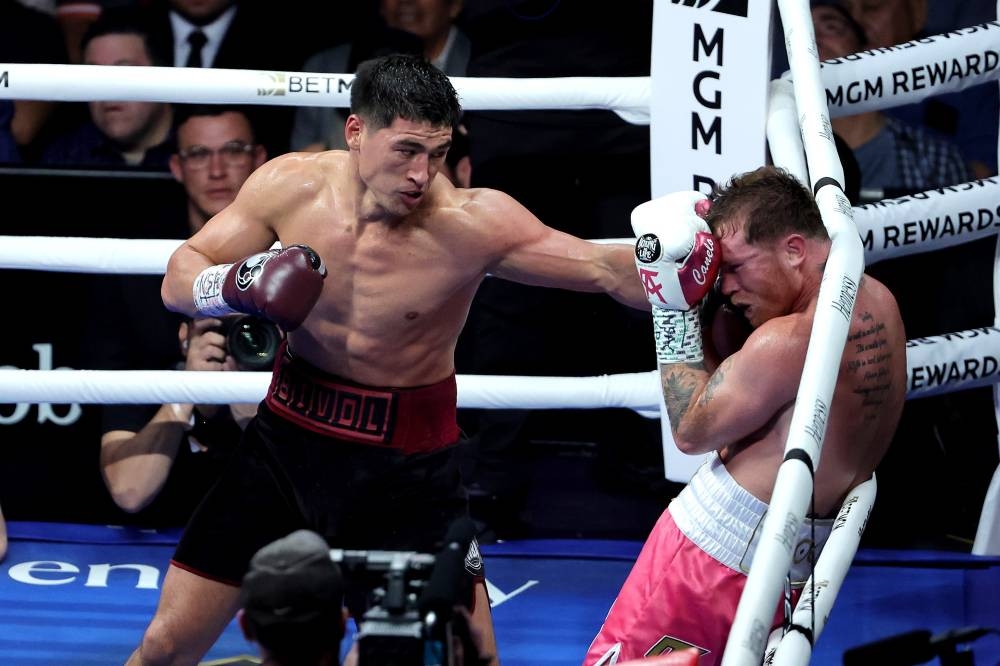 Bivol beats 'Canelo' Alvarez to retain WBA light heavyweight title ...