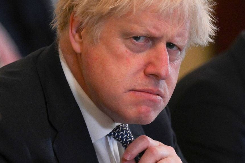 Uks Johnson Under Fire Over Partygate Photos The Manila Times