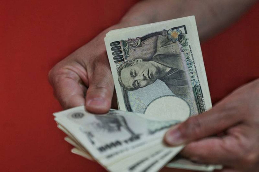 Yen Slides To 24 Year Low Against US Dollar The Manila Times   80008 