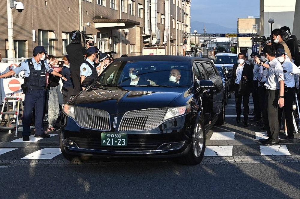 Japan Mourns As Body Of Assassinated Pm Abe Returns To Tokyo The Manila Times