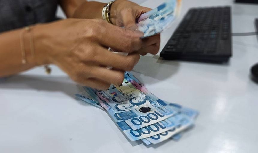 peso-inches-down-at-57-11-vs-us-dollar-the-manila-times