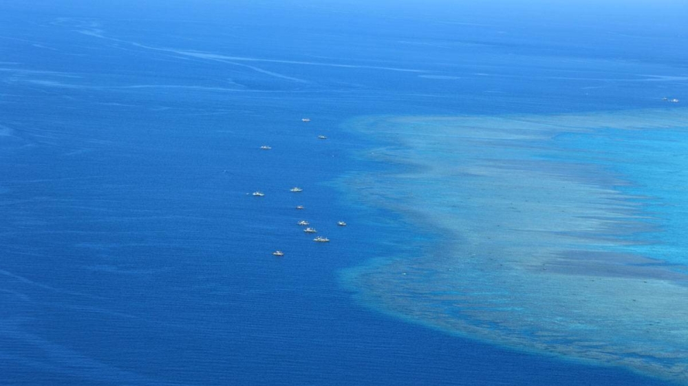 Filipino fishermen  were spotted over Bajo de Masinloc during the aerial surveillance of the Philippine Coast Guard (PCG).  Photo from Philippine Coast Guard