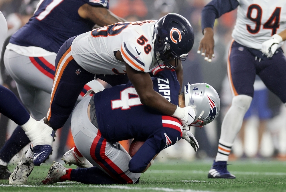 Chicago Bears defensive end Al-Quadin Muhammad (55) walks off the field  following an NFL football game against the New England Patriots, Monday,  Oct. 24, 2022, in Foxborough, Mass. (AP Photo/Stew Milne Stock