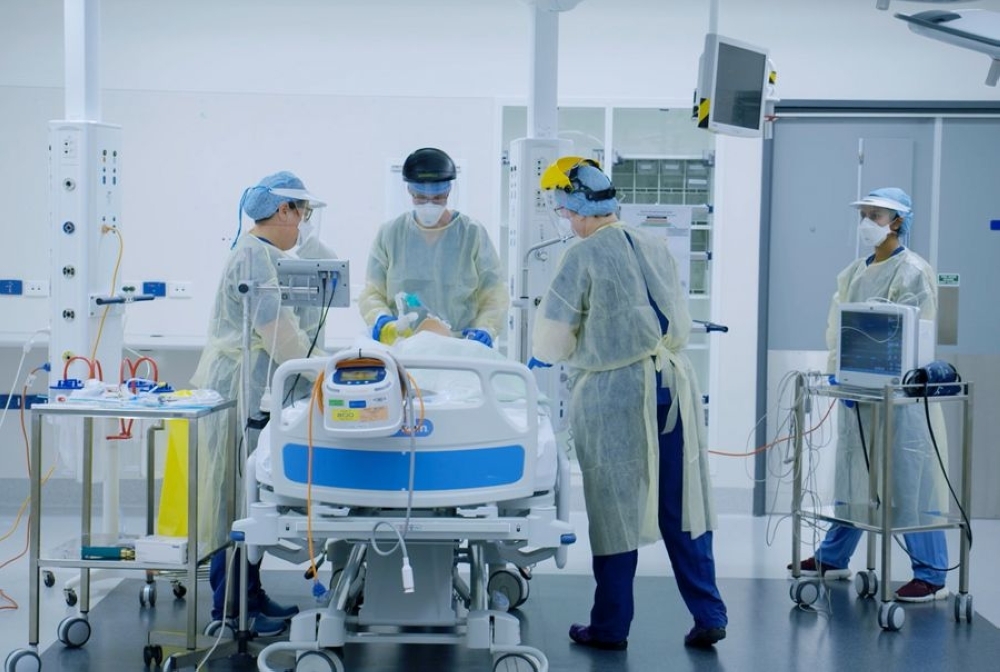 CRUSHING PRESSURE This file photo shows medical workers taking part in training for treating Covid-19 patients at a comprehensive hospital in Auckland, New Zealand on April 3, 2020. NEW ZEALAND MINISTRY OF HEALTH/HANDOUT VIA XINHUA