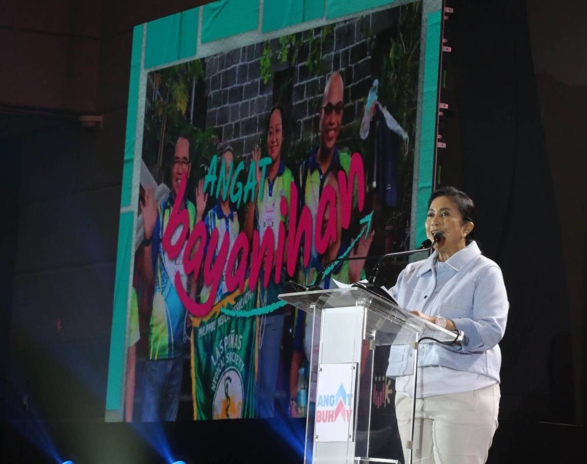 Former vice president Maria Leonor 'Leni' Robredo, head of the Angat Buhay Foundation,  leads in the celebration of its first anniversary in Taguig City on Saturday, July 1, 2023. PHOTO BY RENE H. DILAN