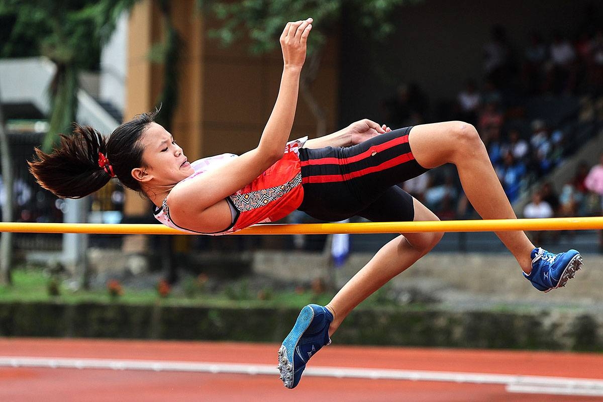 Curtain raiser Region 9’s Giethyl Daze Lubguban clears the bar during the elementary girls high jump event to win the first gold medal in the Palarong Pambansa at the Philsports Track Oval in Pasig City on Monday, July 31, 2023. PHOTO BY RIO DELUVIO