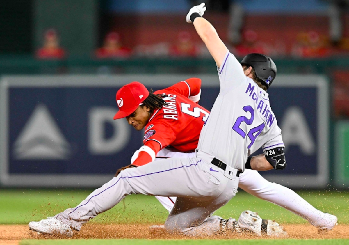 McMahon's sacrifice fly in 10th lifts Rockies to 4-3 win over