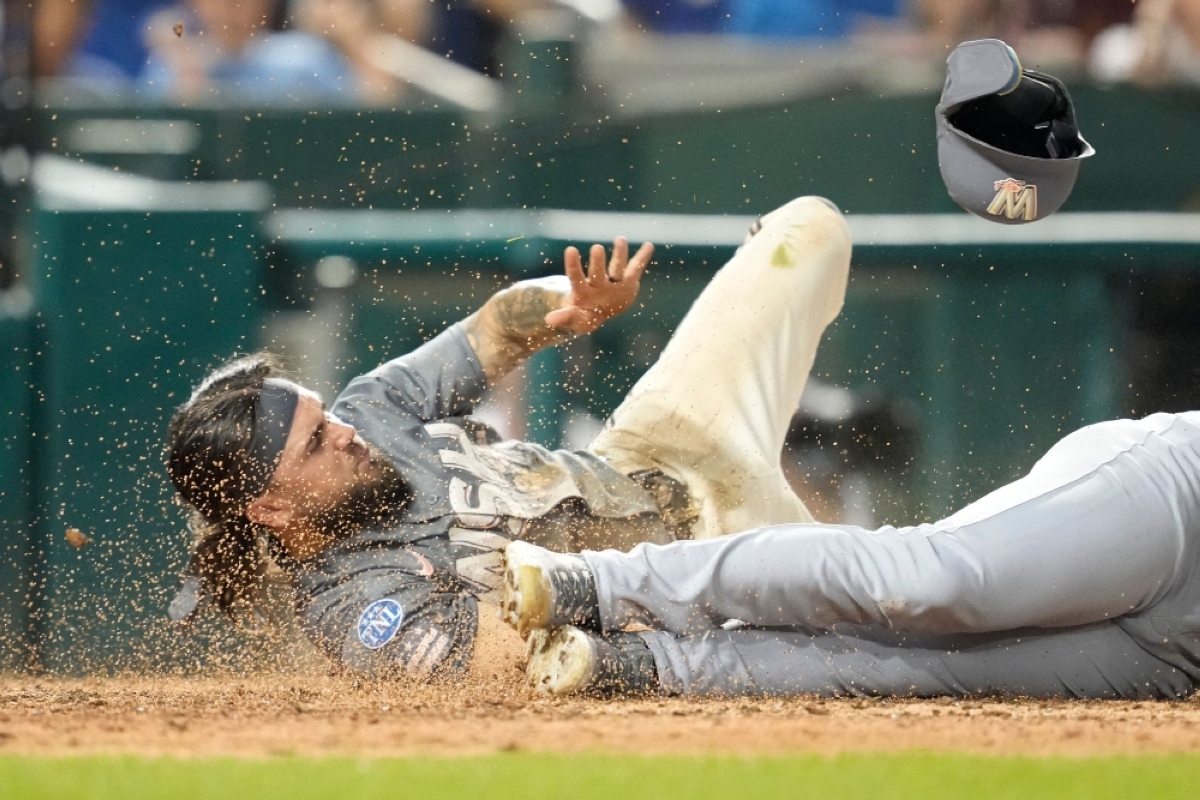 Dodgers endure long rain delay to earn win over Nats