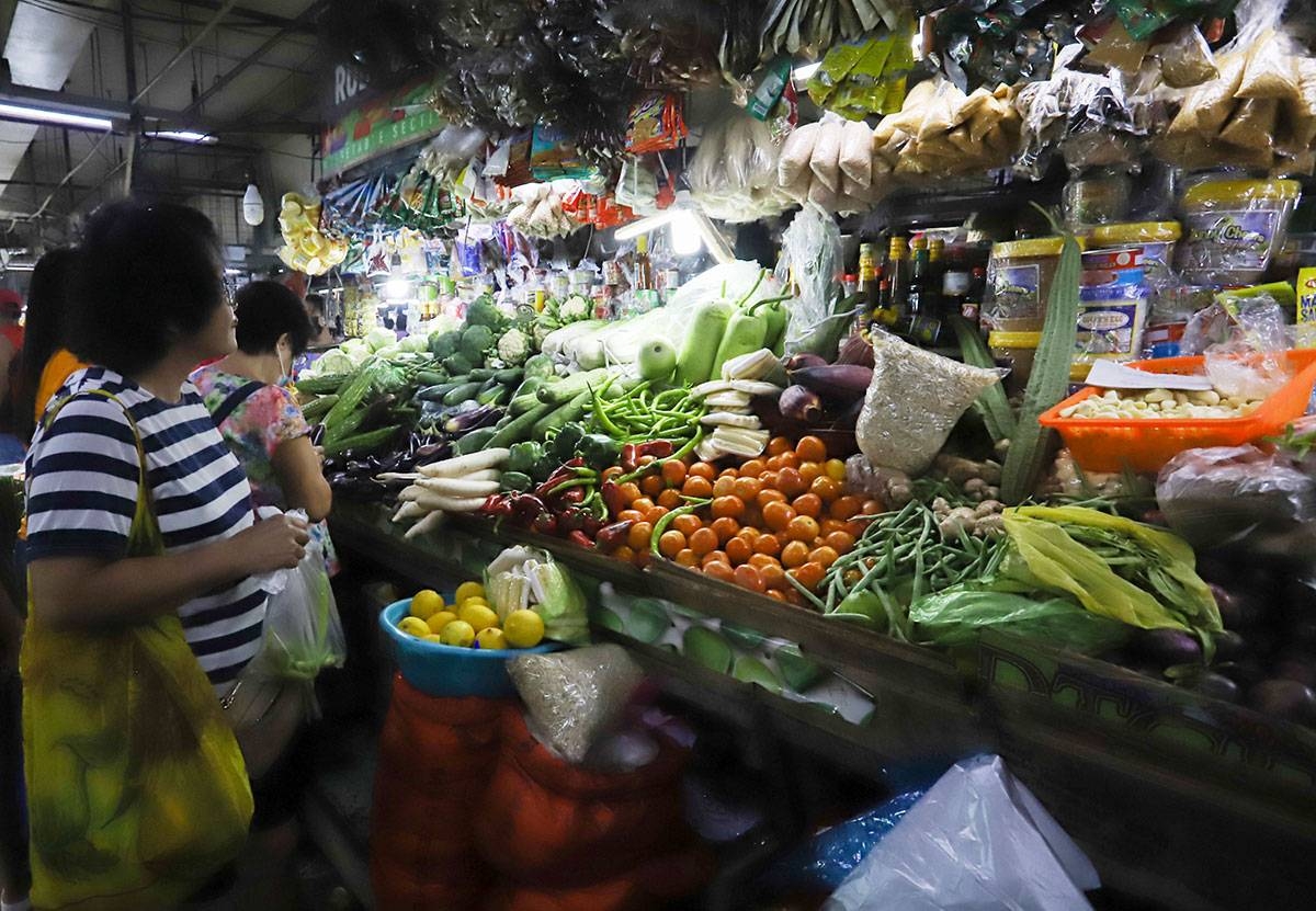 Inflation slows in Oct as food prices decline | The Manila Times