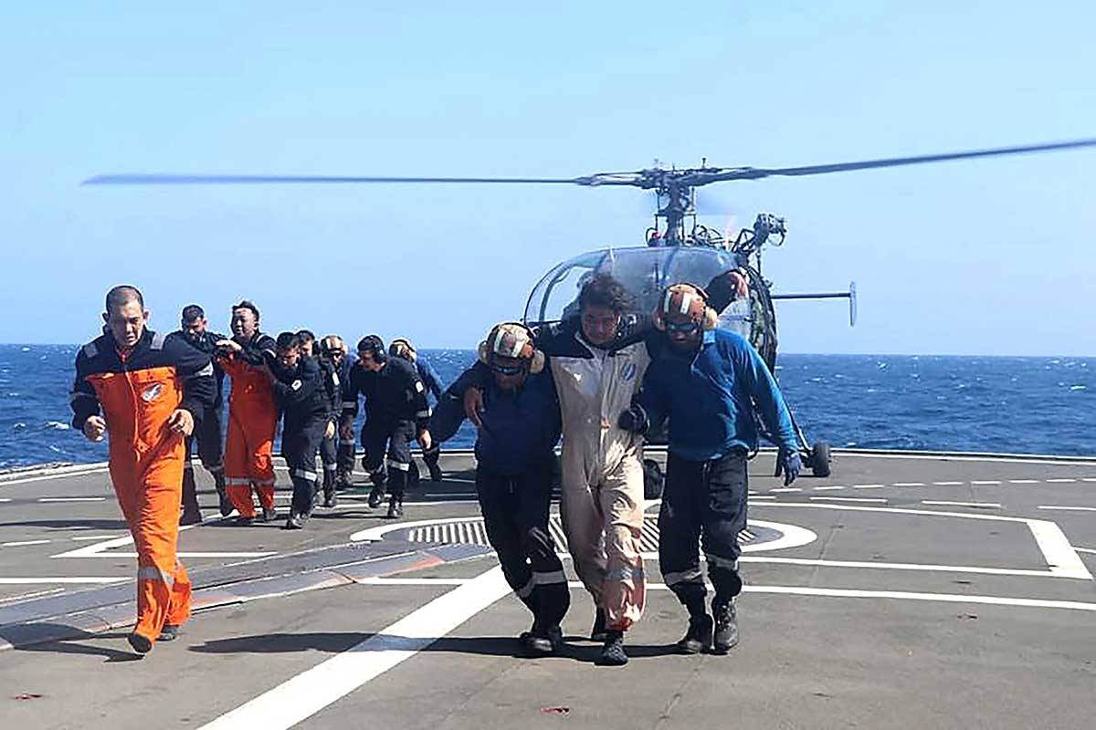 RESCUE This handout photograph taken on Wednesday, March 6, 2024, and released by the Indian Navy shows the rescue operation of crew members of a Barbados-flagged bulk carrier by the Indian Navy after an attack by Yemen’s Houthi rebels. AFP PHOTO