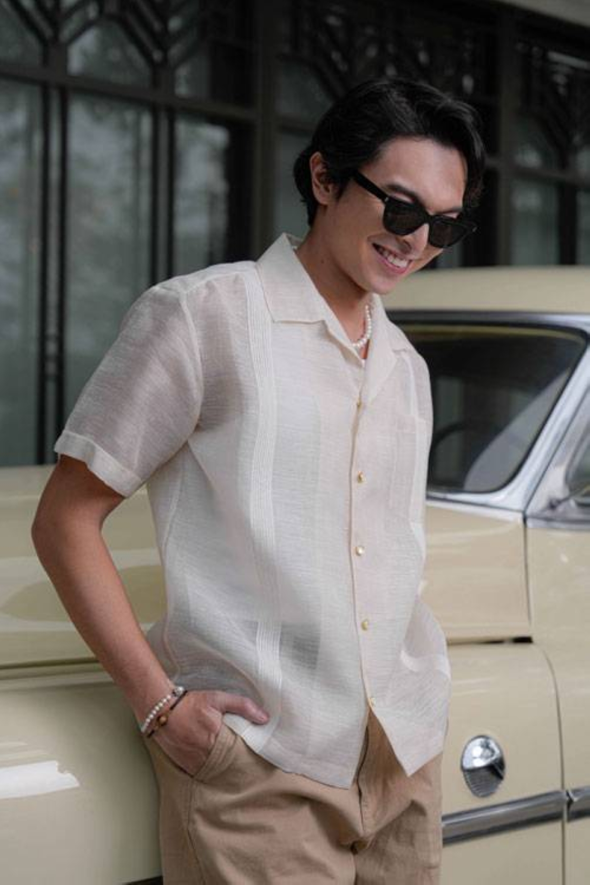 STYLE SHOOTER Fashion model and photography influencer Mikyle Quizon plays it cool in a short-sleeved pink silk polo barong with pintucks.