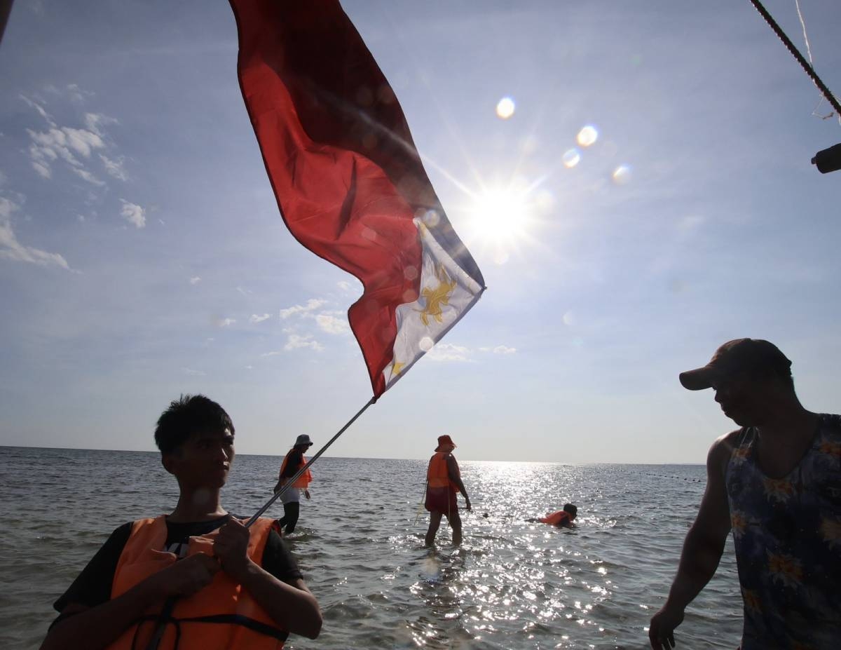 TAKING A DIP | The Manila Times