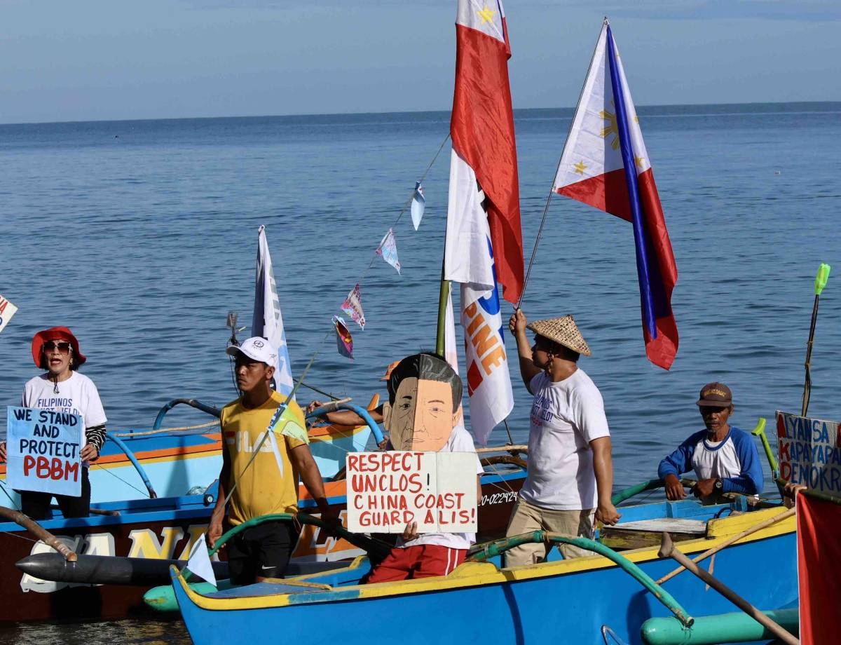 Fisherfolk from Zambales lead a fluvial parade in the West Philippine Sea off Candelaria, on Saturday, May 11, 2024, to express their condemnation of the continuous harassment by the Chinese Coast Guard of Filipino fishers within the Philippines' Exclusive Economic Zone (EEZ), and to show solidarity with President Ferdinand Marcos Jr and fellow Filipinos in asserting sovereign rights in the West Philippine Sea.
PHOTOS BY ISMAEL DE JUAN