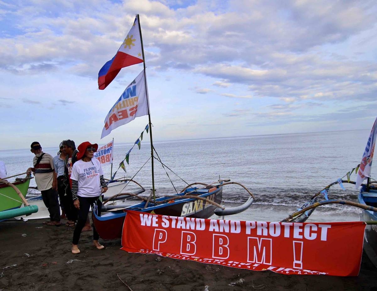 Fisherfolk from Zambales lead a fluvial parade in the West Philippine Sea off Candelaria, on Saturday, May 11, 2024, to express their condemnation of the continuous harassment by the Chinese Coast Guard of Filipino fishers within the Philippines' Exclusive Economic Zone (EEZ), and to show solidarity with President Ferdinand Marcos Jr and fellow Filipinos in asserting sovereign rights in the West Philippine Sea.
PHOTOS BY ISMAEL DE JUAN