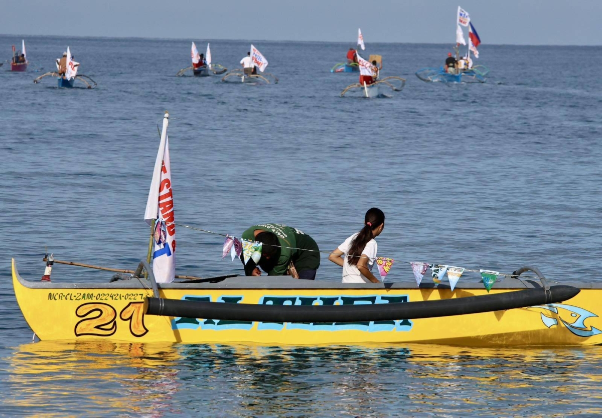 Fisherfolk from Zambales lead a fluvial parade in the West Philippine Sea off Candelaria, on Saturday, May 11, 2024, to express their condemnation of the continuous harassment by the Chinese Coast Guard of Filipino fishers within the Philippines' Exclusive Economic Zone (EEZ), and to show solidarity with President Ferdinand Marcos Jr and fellow Filipinos in asserting sovereign rights in the West Philippine Sea.
PHOTOS BY ISMAEL DE JUAN