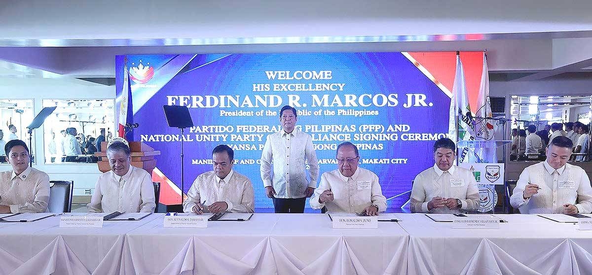 NEW ALLIANCE President Ferdinand Marcos Jr. (center) witnesses the signing of the alliance between the Partido Federal ng Pilipinas (PFP) and National Unity Party (NUP) in a ceremony dubbed ‘Alyansa Para Sa Bagong Pilipinas’ in Makati City on June 29, 2024. Signing were (from left) Rep. Sandro Marcos, PFP deputy majority leader; Special Assistant to the President Antonio Lagdameo Jr., PFP national vice president; South Cotabato Gov. Reynaldo Tamayo Jr., PFP national president; NUP Chairman Ronaldo Puno; Rep. Luis Raymundo Villafuerte Jr., NUP president; and Rep. Albert Raymond Garcia, NUP secretary-general. PHOTO BY NIÑO JESUS ORBETA/PPA POOL