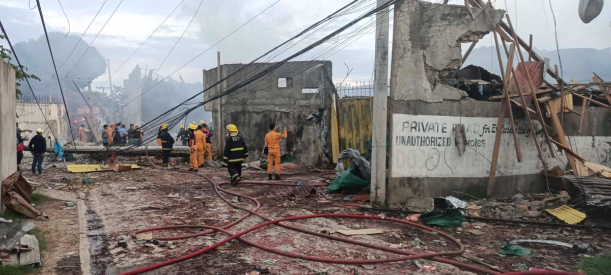 Firemen and rescuers rush to the scene of a firecracker factory blast in Zamboanga City on Saturday afternoon. PHOTOS BY ZAMBOANGA CITY DISASTER RISK REDUCTION MANAGEMENT OFFICE 