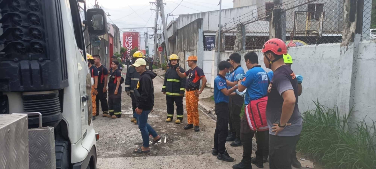 Firemen and rescuers rush to the scene of a firecracker factory blast in Zamboanga City on Saturday afternoon. PHOTOS BY ZAMBOANGA CITY DISASTER RISK REDUCTION MANAGEMENT OFFICE 