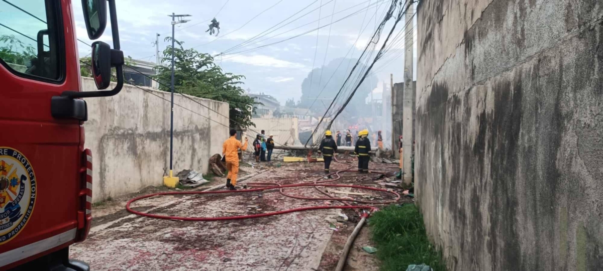 Firemen and rescuers rush to the scene of a firecracker factory blast in Zamboanga City on Saturday afternoon. PHOTOS BY ZAMBOANGA CITY DISASTER RISK REDUCTION MANAGEMENT OFFICE 