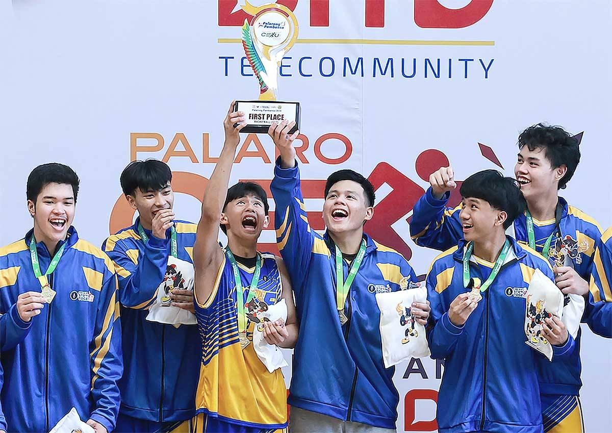 CHAMPS! NCR bets celebrate after winning the boys secondary basketball crown in the 64th Palarong Pambansa held in Cebu City. The Big City retained the overall championship title after winning a total of 98 gold medals. PHOTO BY RIO DELUVIO