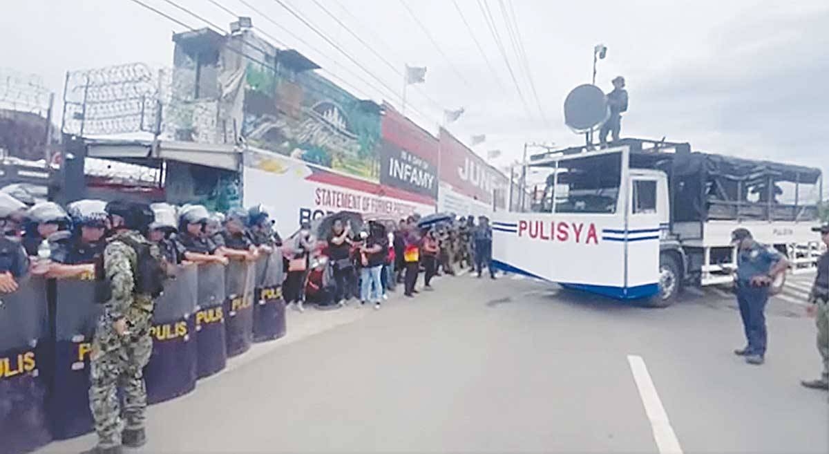 FULL FORCE Police contingents from different regions in Mindanao are deployed to the Kingdom of Jesus Christ Compound in Davao City on August 24, 2024, to provide law and order amid the impending arrest of its founder, Pastor Apollo Quiboloy, who is believed to be hiding in his church. Some 2,000 police officers stormed the compound around 5 a.m. but could not find Quiboloy. The self-proclaimed “Son of God” is accused of human trafficking and child abuse. SCREENGRAB FROM PNA FACEBOOK PAGE