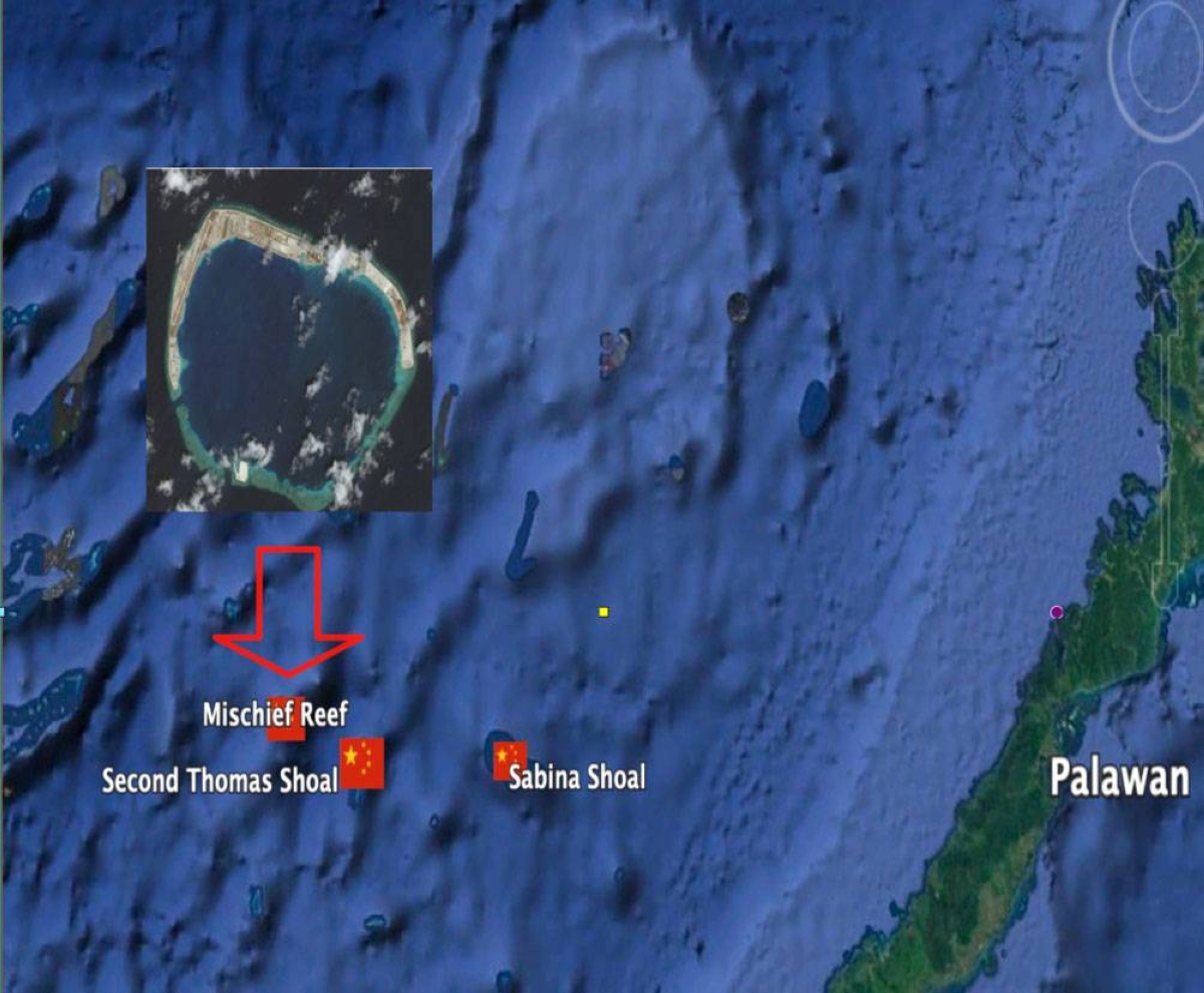 Two shoals Marcos recently gave up to China; (inset) closer view of Mischief Reef, a major Chinese fortification near the two shoals.