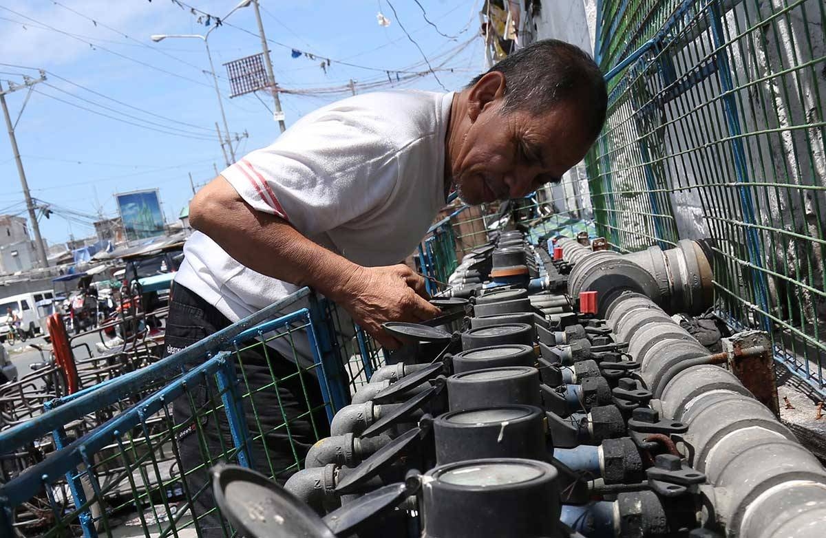 Manila Water rates up; Maynilad's going down