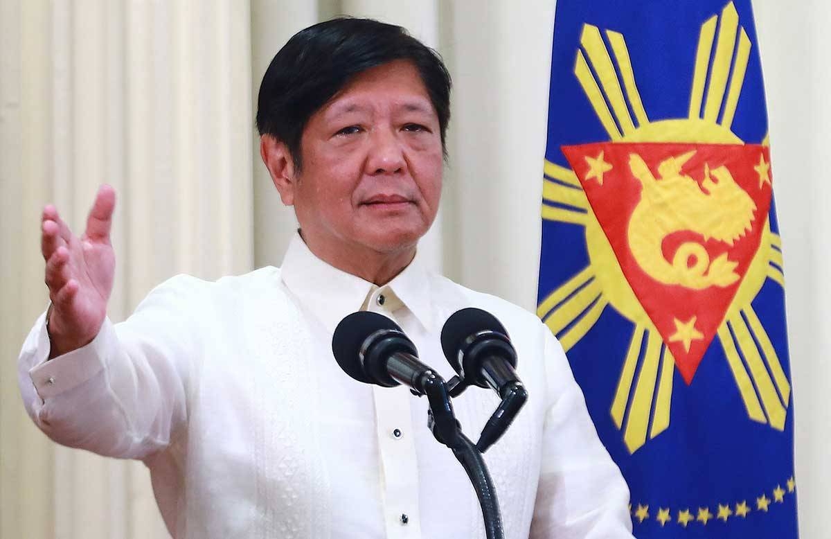 Marcos eyes higher flood walls to control flooding