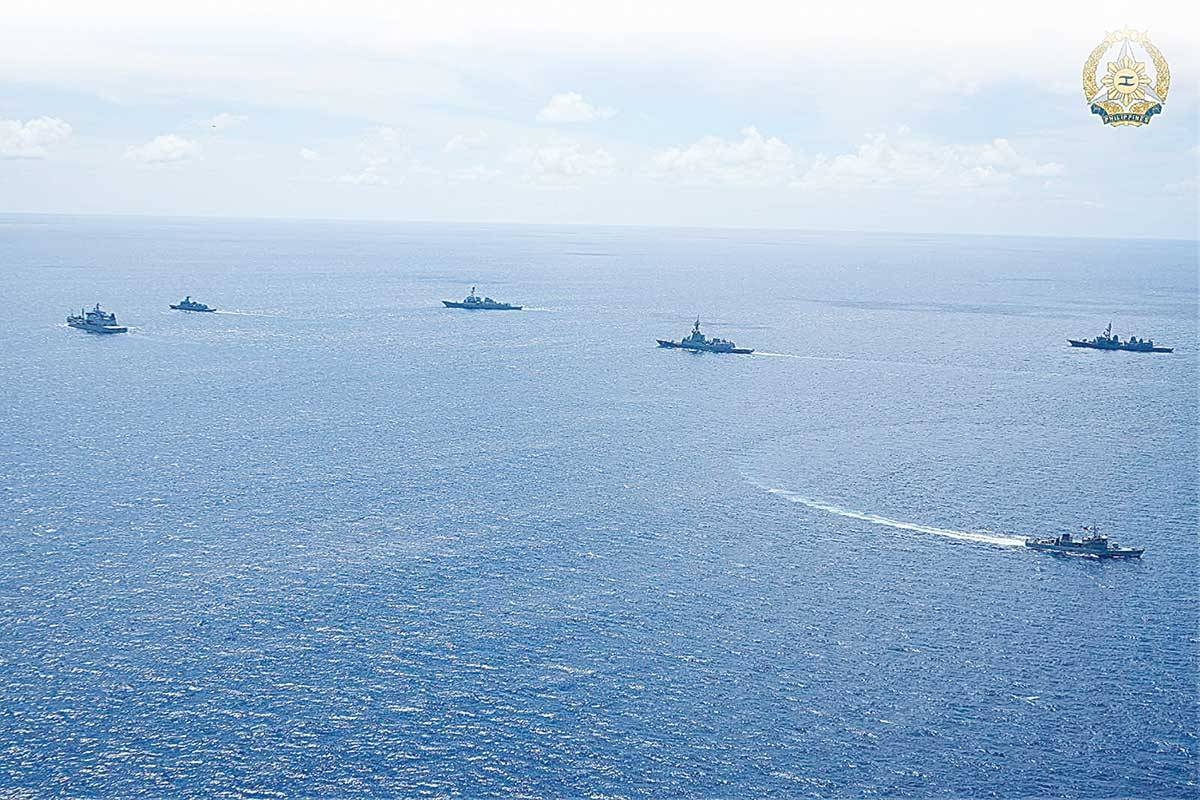 JOINT PATROL The formation features (from left) the HMNZS Aotearoa (A-11), BRP Antonio Luna (FF 151), USS Howard (DDG 83), HMAS Sydney (D 48), and JS Sazanami (DD 113), with BRP Emilio Jacinto (PS 35) as the breakaway vessel. They are part of the 4th Multilateral Maritime Cooperative Activity, which showcases the coordinated division tactics within the country’s exclusive economic zone in the West Philippines Sea on Sept. 28, 2024. PHOTO COURTESY OF THE CRSAFP