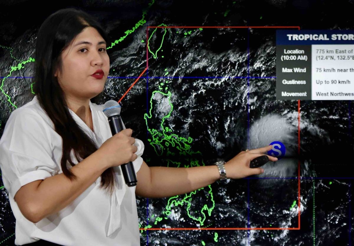 Weather forecaster Veronica Torres provides an update on Typhoon Mars tracking hours after it entered the Philippine area of ​​responsibility. PHOTOS BY ISMAEL DE JUAN