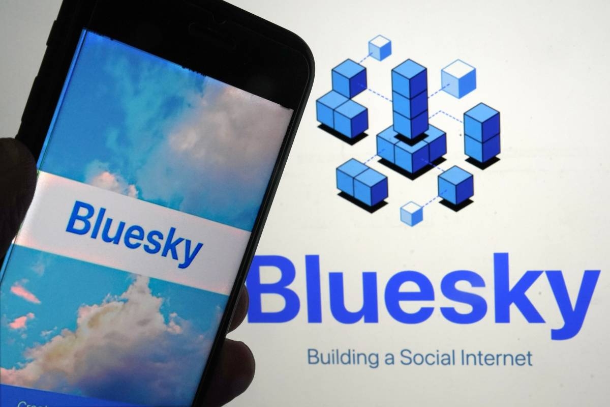 The app for Bluesky is shown on a mobile phone, left, and on a laptop screen on June 2, 2023, in New York.  AP PHOTO