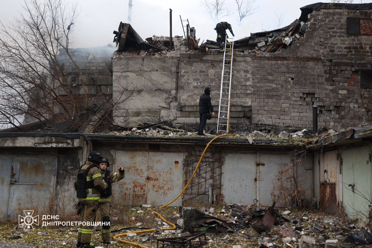 This handout photograph taken and released by the Ukrainian Emergency Service on November 21, 2024 shows Ukrainian firefighters work on a spot following an air-attack, in Dnipro, amid the Russian invasion of Ukraine. - Moscow on Thursday launched an intercontinental ballistic missile at Ukraine for the first time, Kyiv said, marking the latest escalation of the conflict after Ukraine fired Western-supplied long-range missiles on Russia. The Ukrainian air force said Russian forces had used the missile in an early morning attack on the city of Dnipro, while a source confirmed to AFP it was the first such use of the weapon by Moscow since the invasion in 2022. (Photo by Handout / State Emergency Service of Ukraine / AFP) / RESTRICTED TO EDITORIAL USE - MANDATORY CREDIT "AFP PHOTO / UKRAINIAN EMERGENCY SERVICE" - NO MARKETING NO ADVERTISING CAMPAIGNS - DISTRIBUTED AS A SERVICE TO CLIENTS