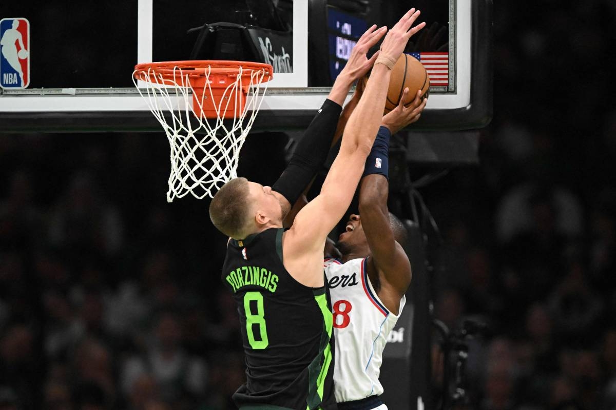 ERASED Kristaps Porzingis (left) of the Boston Celtics blocks a shot from Kris Dunn of the LA Clippers during the second quarter at the TD Garden on Nov. 25, 2024, in Boston, Massachusetts. AFP PHOTO