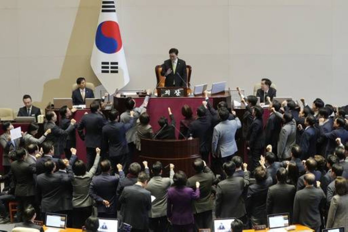 CHAOS Lawmakers of the ruling People Power Party protest during a plenary session for the impeachment motion against South Korean Acting President Han Duck-soo at the National Assembly in Seoul on Dec. 27, 2024. AP PHOTO