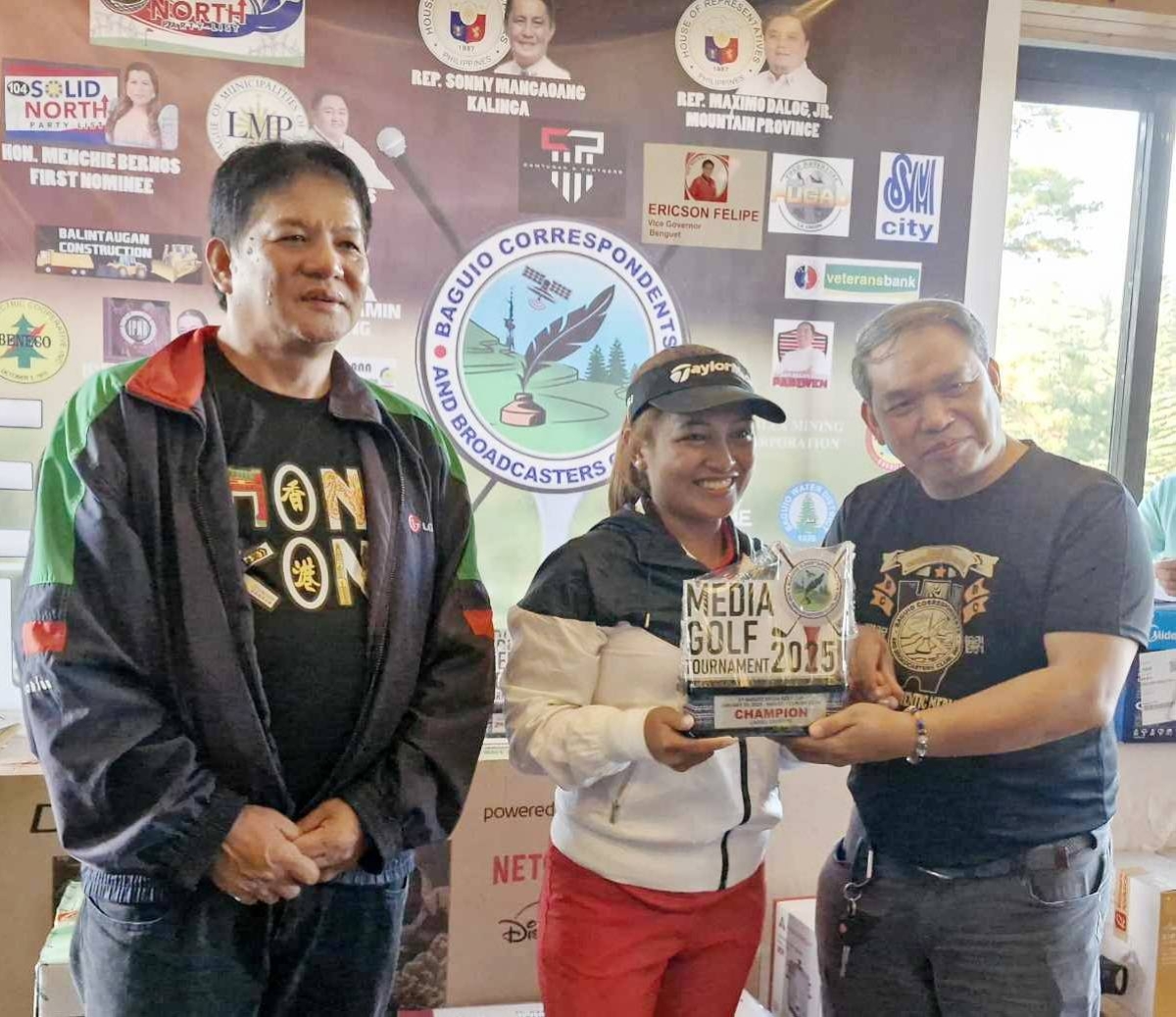 BEST GOLFER Demma Dulnuan (center) receives her trophy after finishing with the best score in the Baguio Media Golf 2025 at the Baguio Country Club on Jan. 25, 2025. BCBC PHOTO