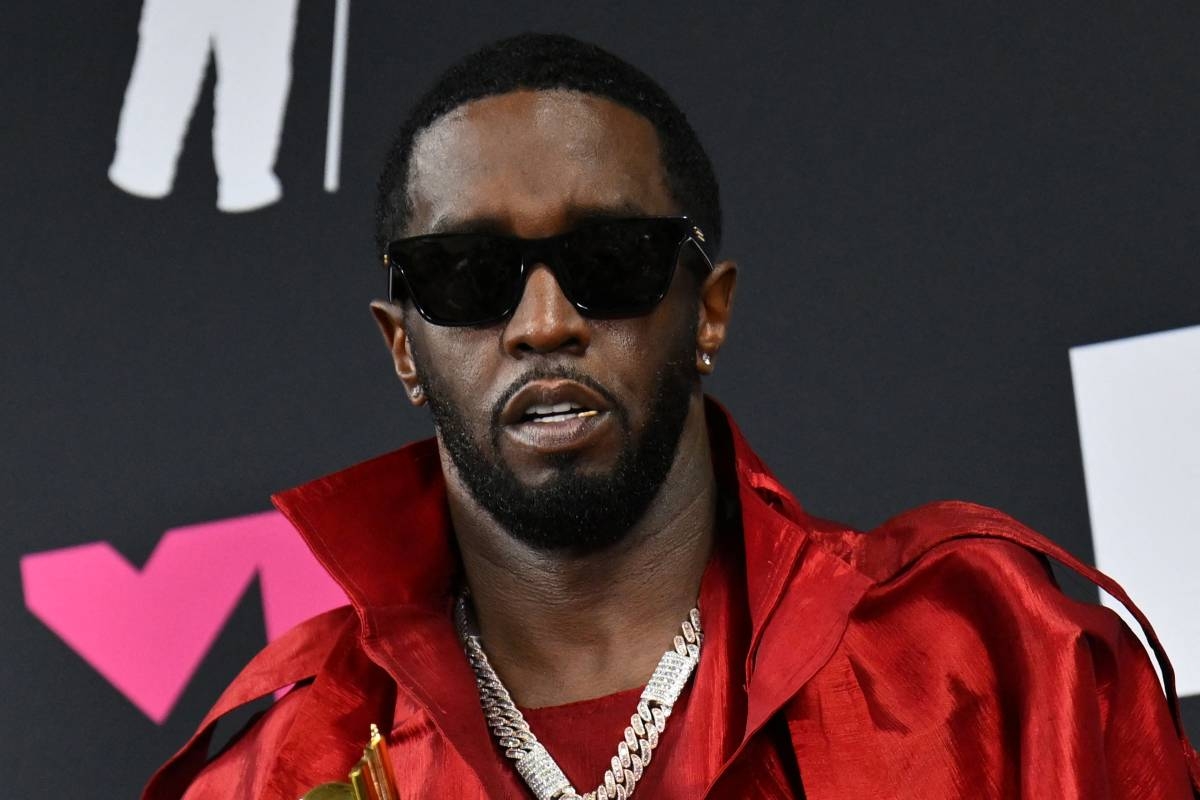 US producer-musician Sean "Diddy" Combs poses with the Global Icon award in the press room during the MTV Video Music Awards at the Prudential Center in Newark, New Jersey, on September 12, 2023. (Photo by ANGELA WEISS / AFP)