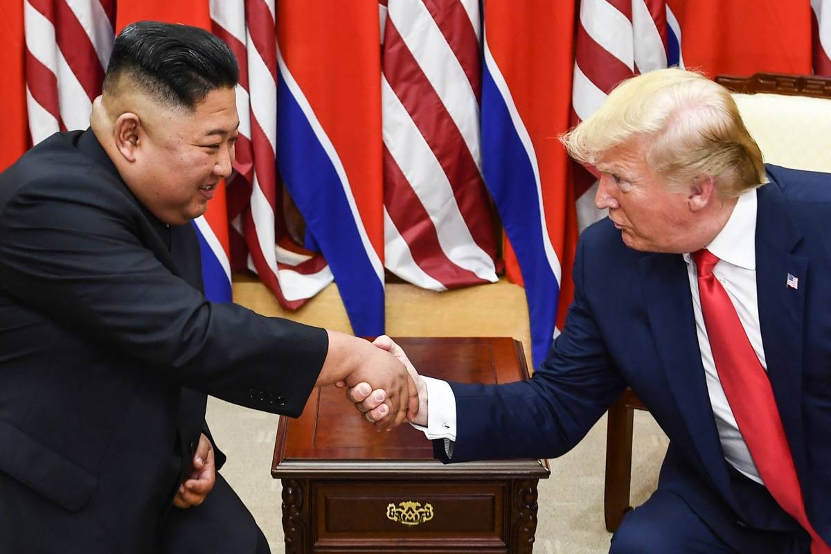 North Korea's leader Kim Jong Un (left) and US President Donald Trump shake hands during a meeting on the south side of the Military Demarcation Line that divides North and South Korea, in the Joint Security Area (JSA) of Panmunjom in the Demilitarized zone (DMZ) on June 30, 2019. AFP PHOTO