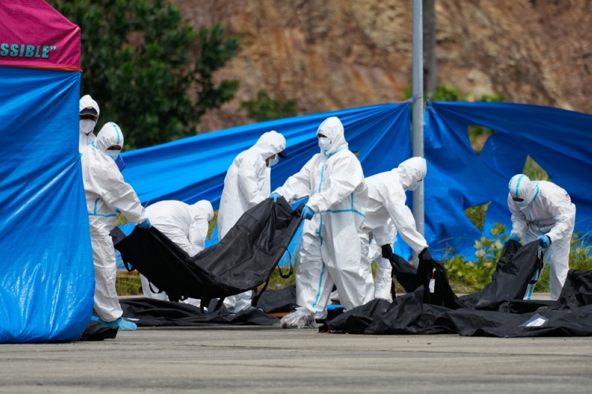 Rescuers pull more victims from charred ferry
