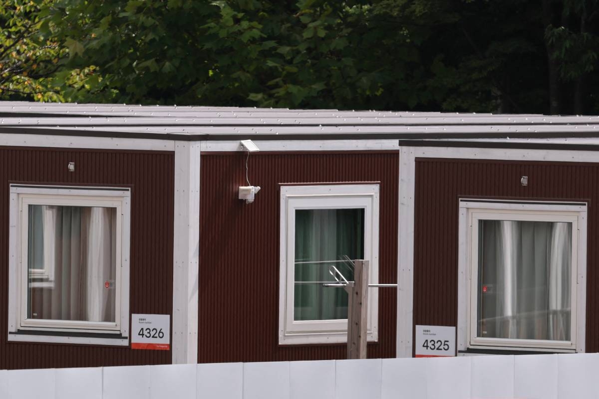 IOC president impressed by 'beautiful' Asian Games wooden huts