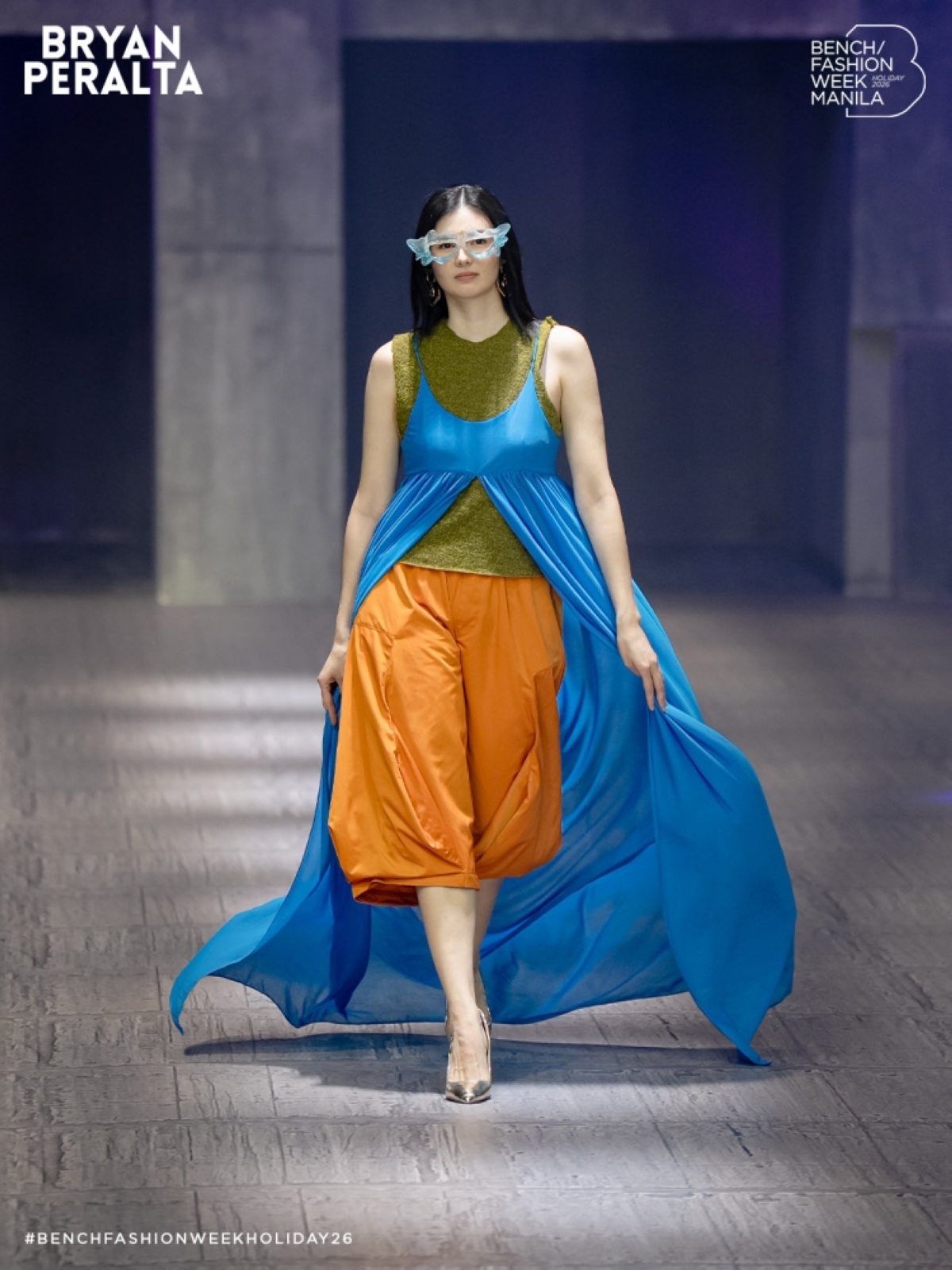 Common caption: Flowing, jewel-toned jackets by Bryan Peralta
