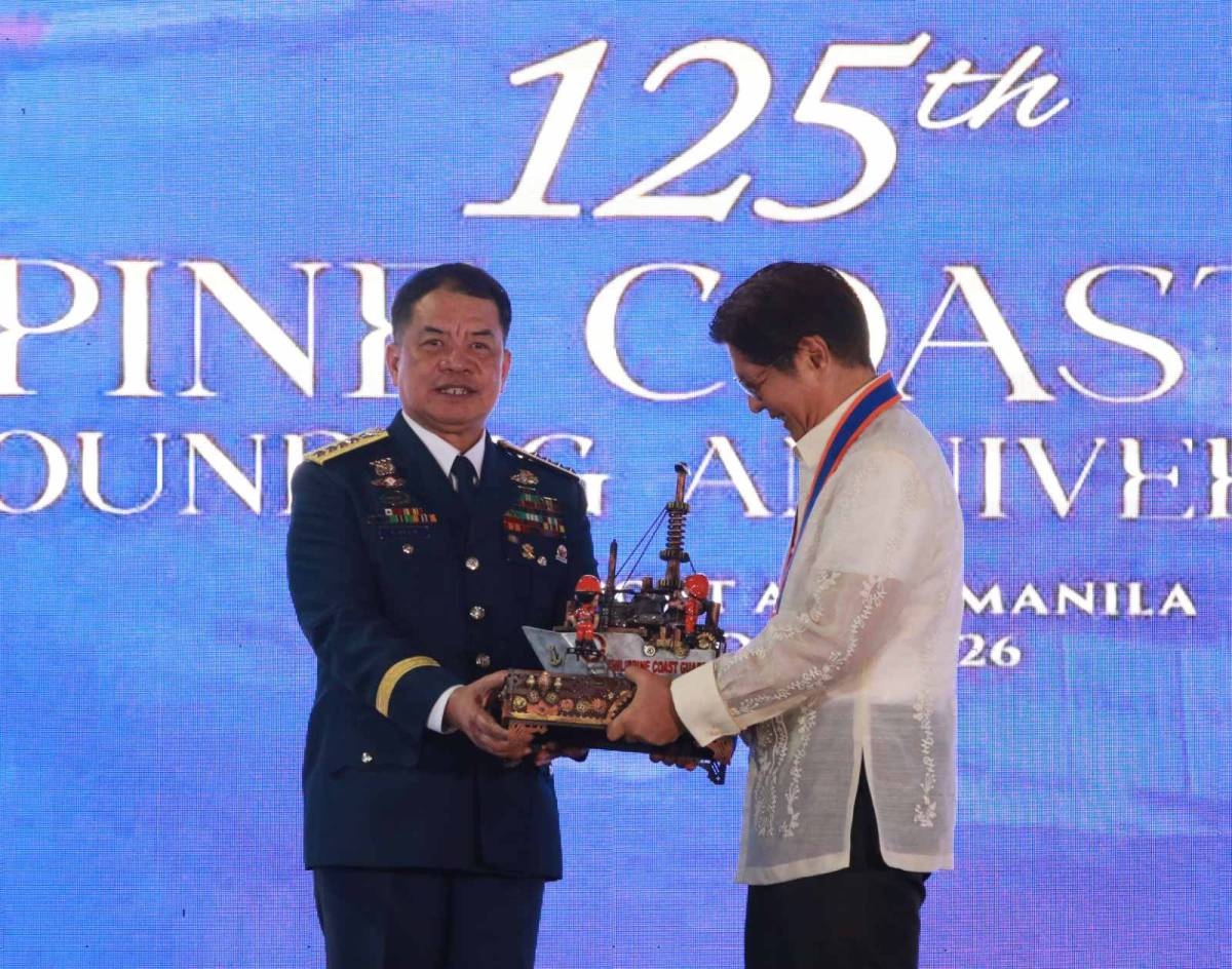 President Ferdinand Marcos Jr. does a pass-in-review at the 125th founding anniversary of the Philippine Coast Guard (PCG) at South Harbor, Port Area in Manila on Oct. 16, 2026. PHOTOS BY RENE H. DILAN